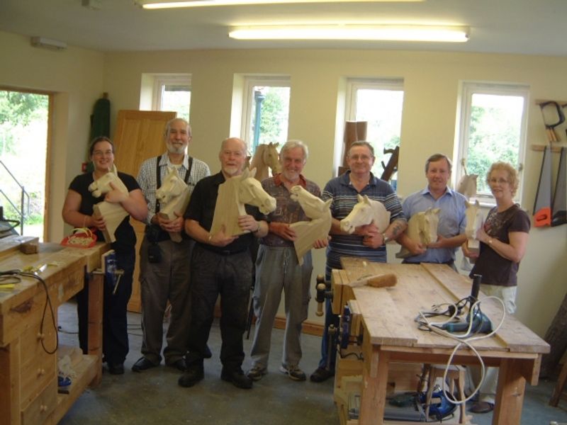  happy rocking horse carving students