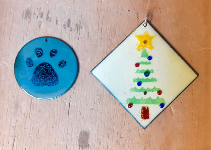 A paw print design and a Christmas decoration.