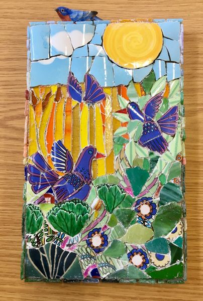 Mixed media mosaic made with stained glass, tumbled glass and re-cycled china