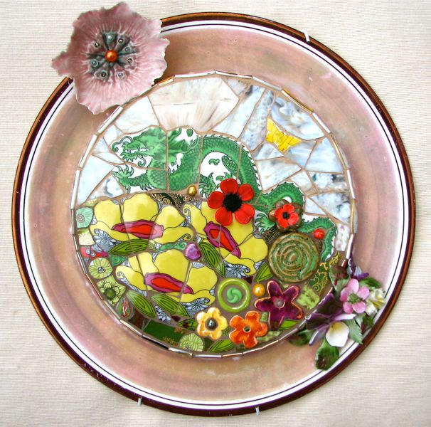 Mixed media mosaic on a vintage plate