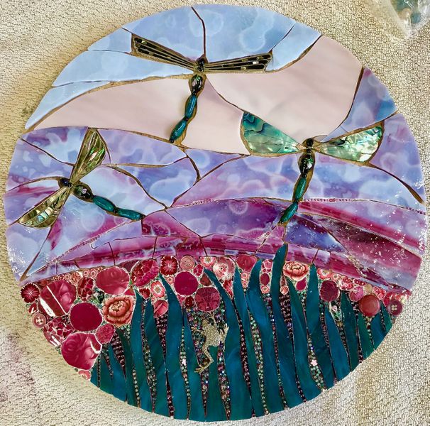 Wendy;s Dragonflies - amixed media mosaic created using stained glass, vintage china, Paua shell and various seed beads.
