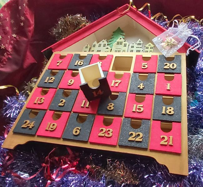 This is a Reusable Hand Painted Christmas Calendar Countdown