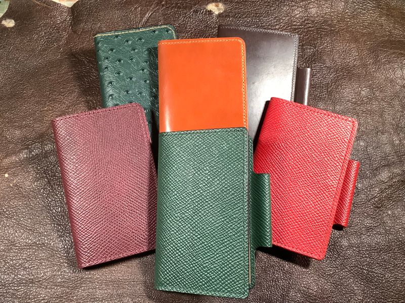 Sample notebook holders showing a range of colours and leathers.