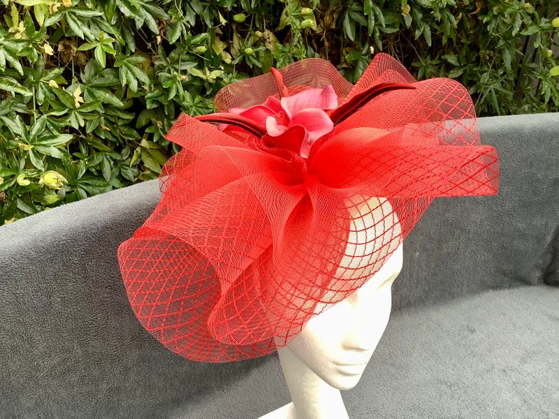 Red patterned crinoline with lillies and feather detail