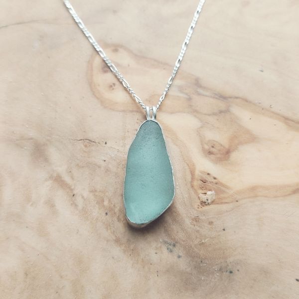 Students work, a seaglass necklace
