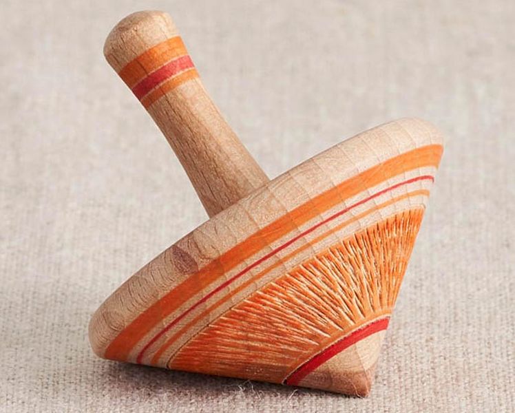 Orange and red wooden spinning top.