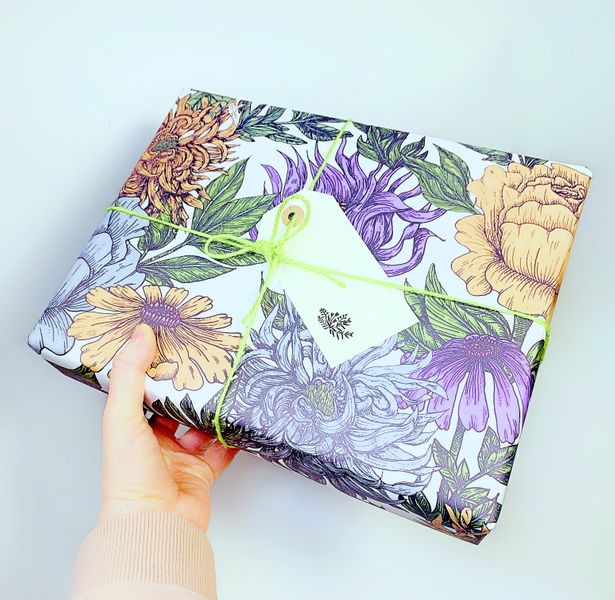 Delux floral style wrapping paper ideal for a gardener! with hand written hand stamped gift tag