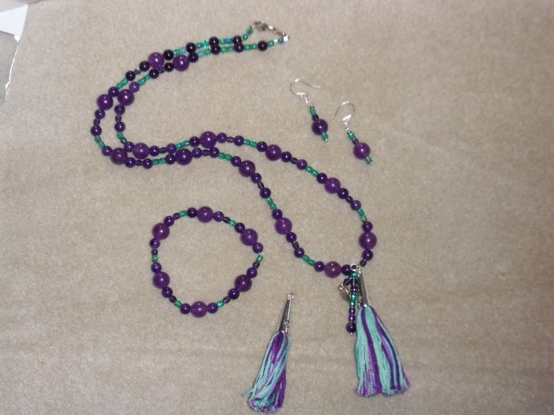 Beaded necklace, bracelet and earrings set