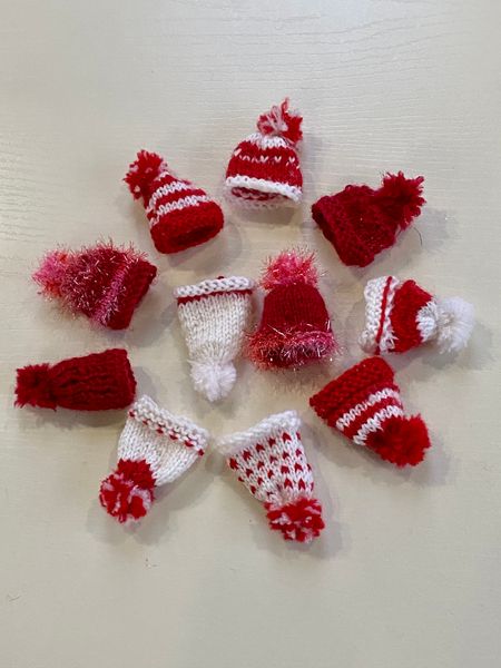 Every kit contains a woolly hat to keep your angel's ears warm - hand knitted by volunteers.