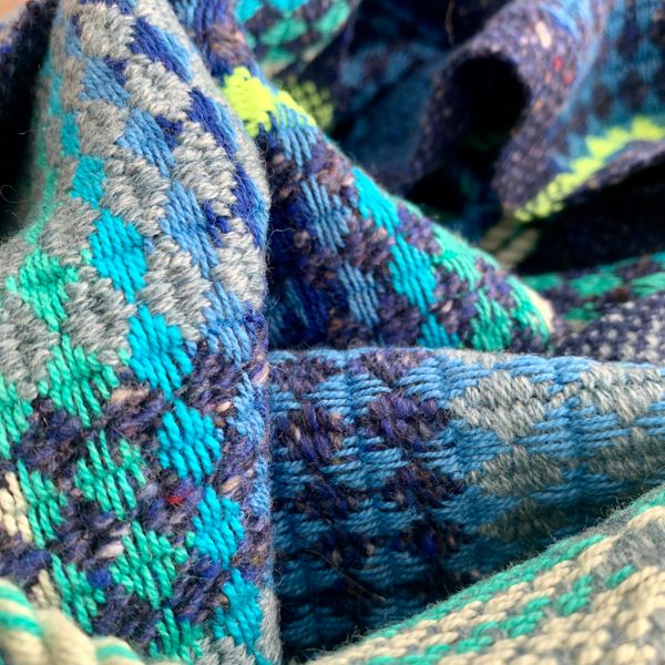 Hand woven scarf, close up.