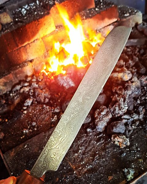 A finished Damascus steel kitchen knife