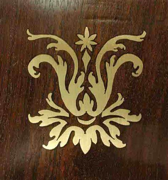 Boulle marquetry incorporating brass