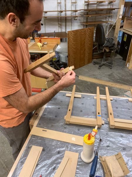 Gluing the final tenons before assembly.
