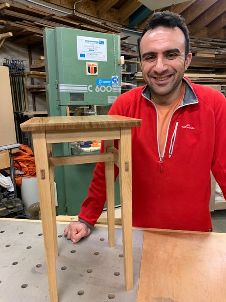 Another delighted student shows off his table.