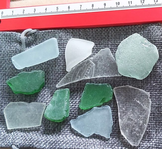 ECO SEA GLASS PIECES VARIOUS STYLES AND SIZES VERY RARE THAT TWO PIECES LOOK SIMILAR WHEN FOUND NATURALLY.