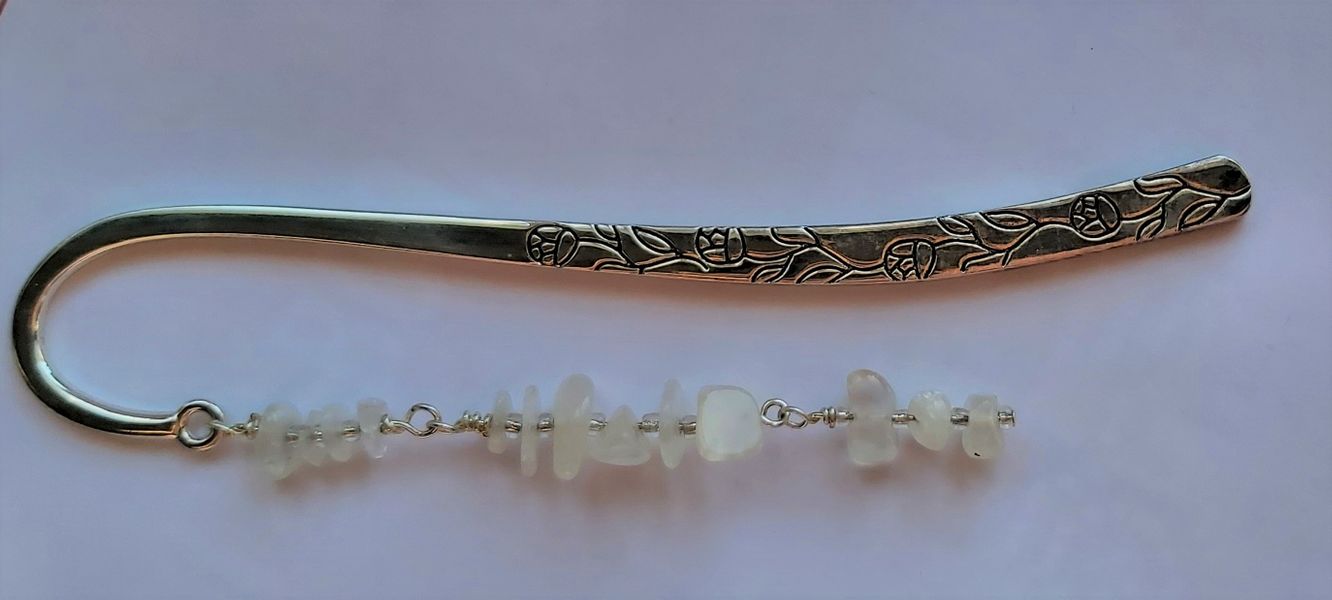 Moonstone decorates the Silver Embossed Bookmark, no more corner folds in your books.