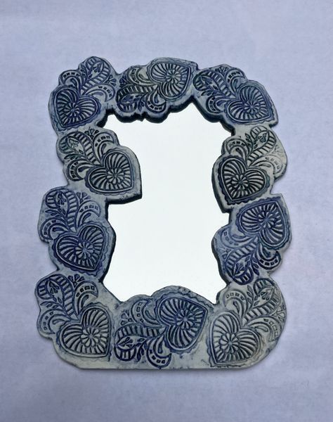 Porcelain mirror frame