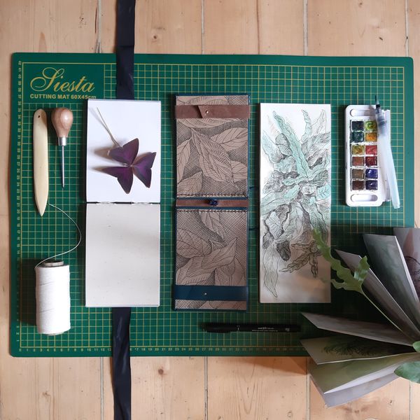 Sketchbooks and tools of the bookbinding craft