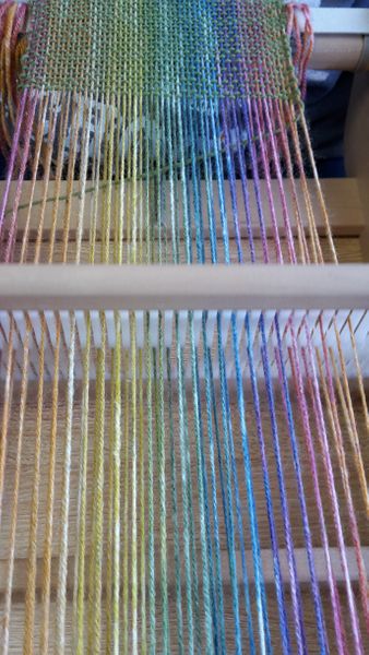 Variegated warp on the loom and ready to weave