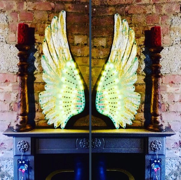 Centre piece Angel wings decorated with gold leaf, rhinestones and LED lights