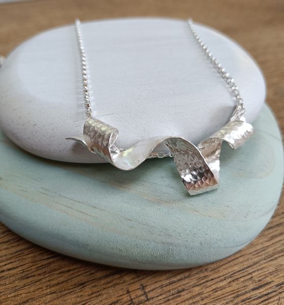 Marney's anticlastic textured silver necklace