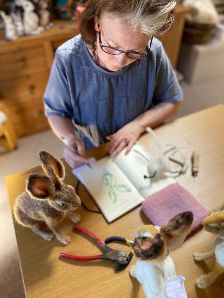 Cecily Kate sketching and honing the shape of the Brown Hare