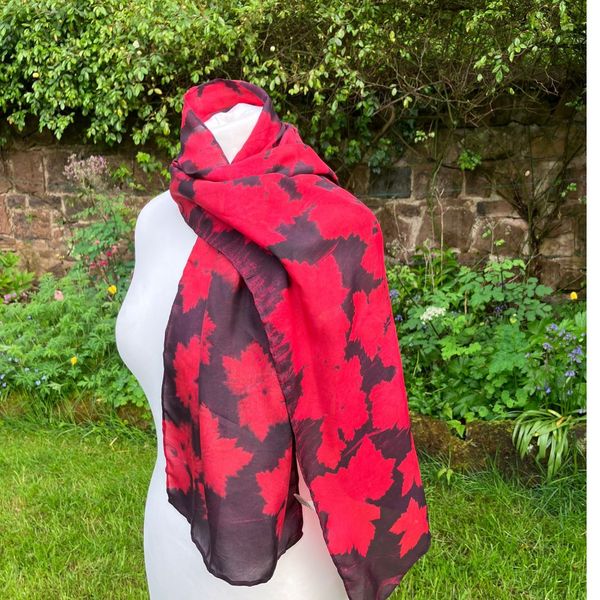 Peace silk scarf dyed with cochineal and iron, printed with hardy geranium