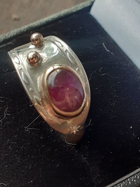 Made this recently: sterling with star ruby set in 9kt, 9kt accents, got a friend to star set a few 1mm diamonds. Fiance loved it as an anniversary present! Took me less than three hours to do from hacking the vintage teaspoon apart for the band.