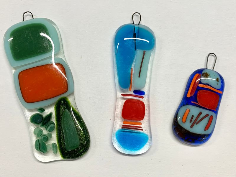 Glass fused pendants, student work