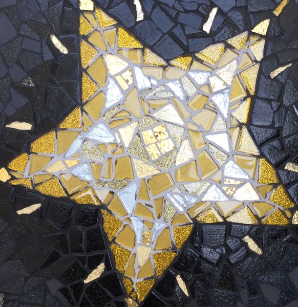 Christmas Star in several shades of 
gold and silver glass

