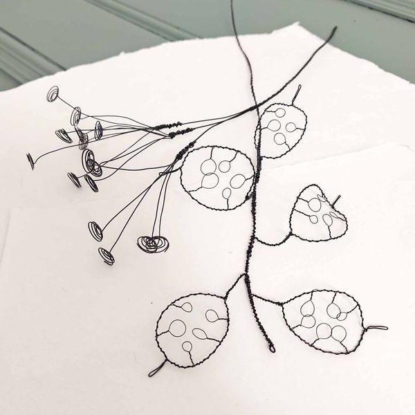 Wire seed head examples by Judith Brown