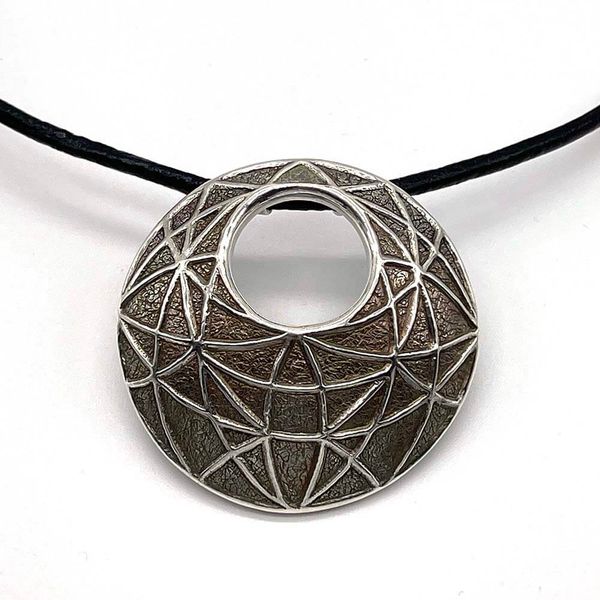 Geometric pendant with no colour. 