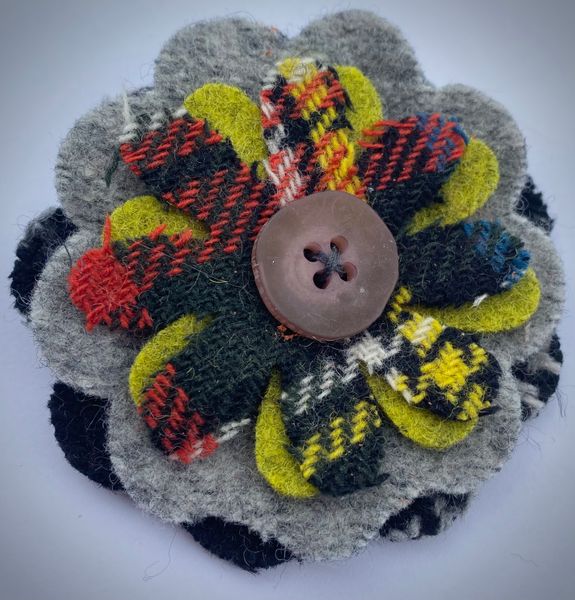 Felted knitting and tartan check corsage