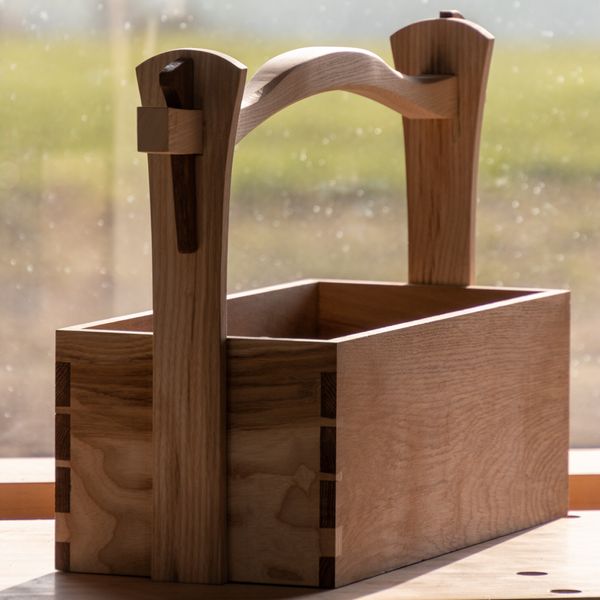 Hand-made Tote Box with dovetails and a hand-shaped handle.
