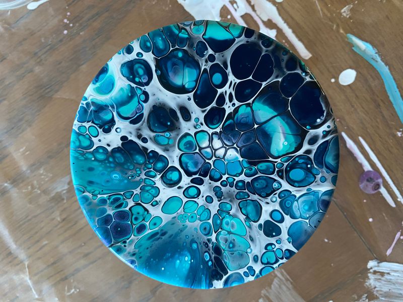 Paint 4 coasters after experimenting with tiles