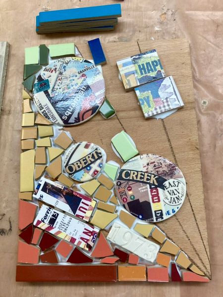 Mosaic in progress, incorporating de-cal fired collage tiles made in the workshop.