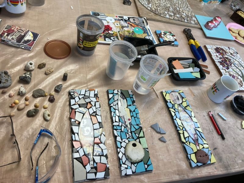 Mosaic in progress, incorporating de-cal fired collage tiles made in the workshop.