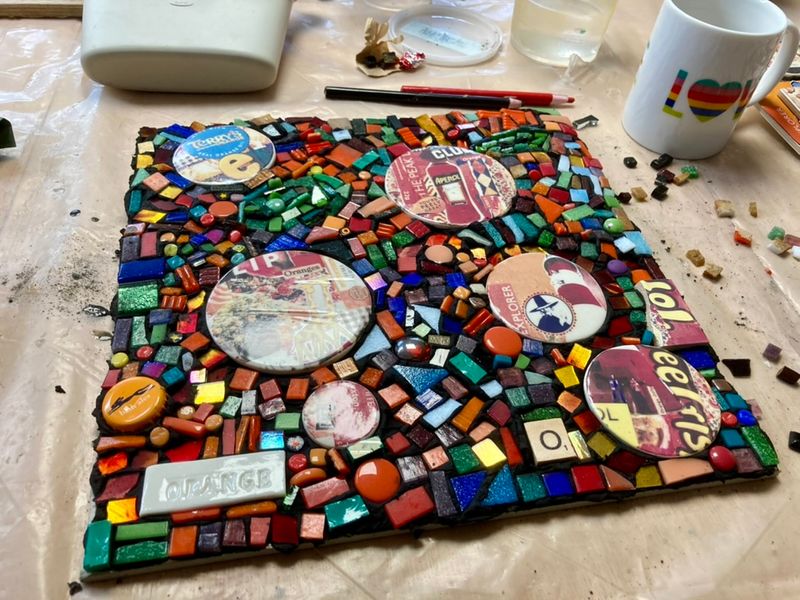 Mosaic in progress, incorporating de-cal fired collage tiles made in the workshop.