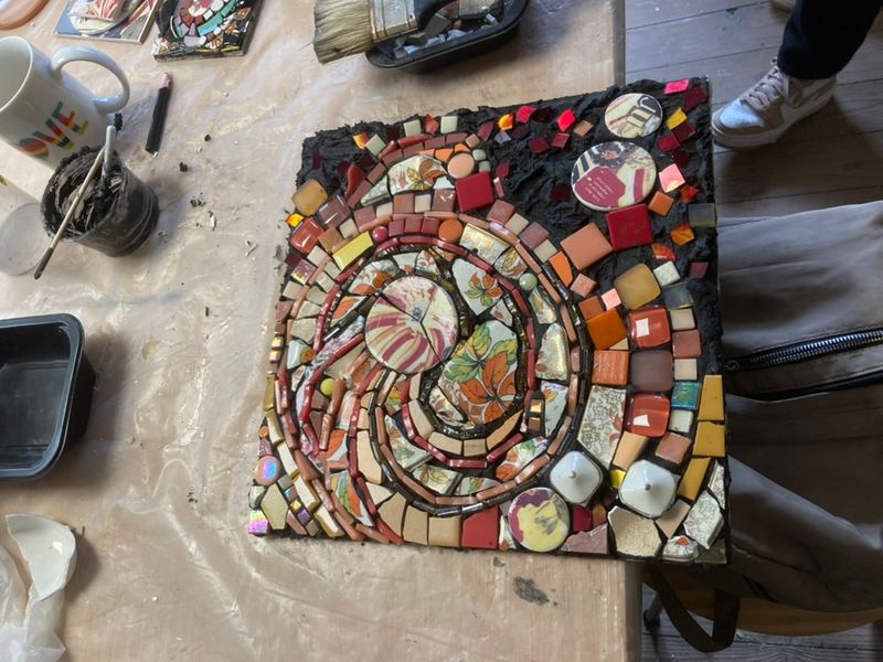 Mosaic in progress, incorporating de-cal fired collage tiles made in the workshop.