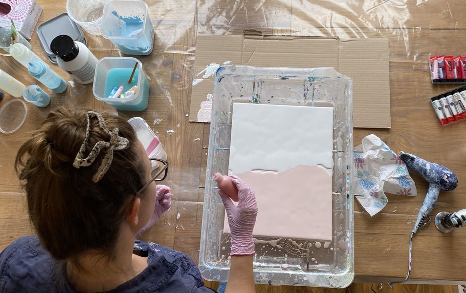 Learn how to prepare your canvases and your working area - acrylic pour is messy, but fun!