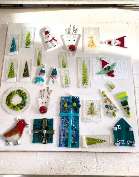 Examples of a variety of Christmas decorations made over a one day course, fresh out of the kiln.