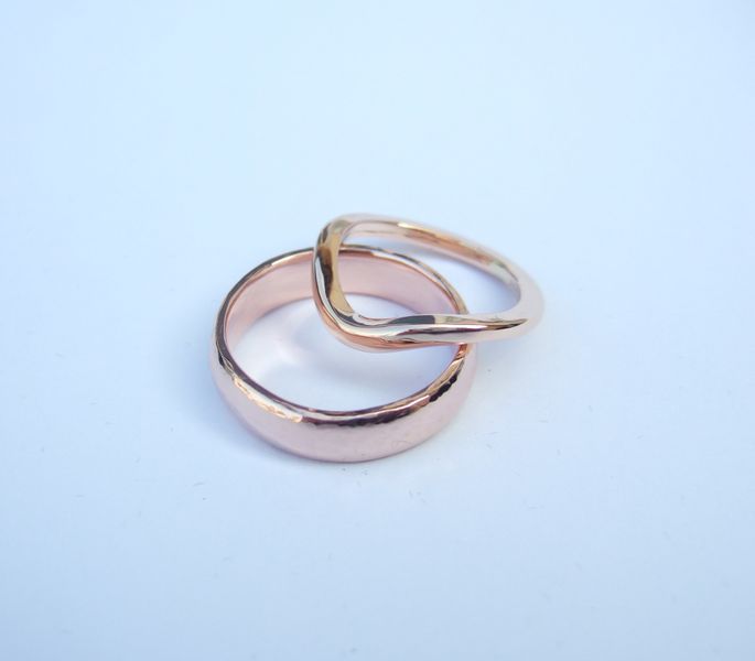 pair of rose gold wedding rings