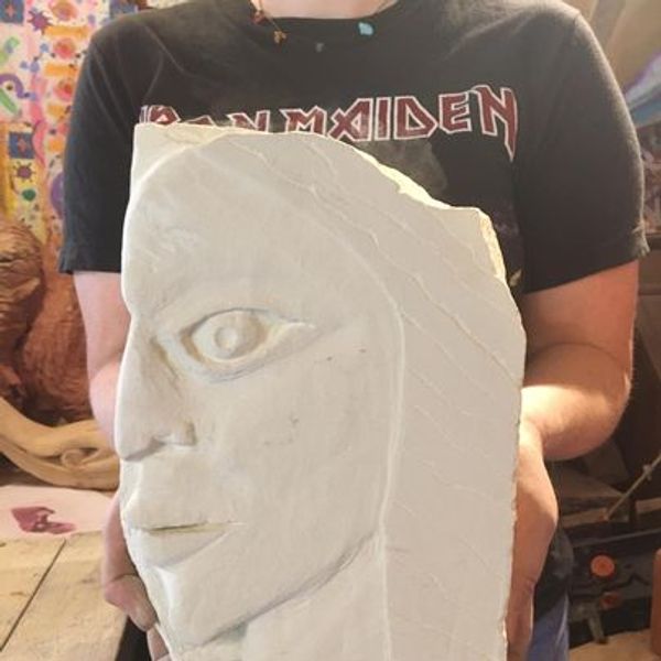 Portrait carving by student