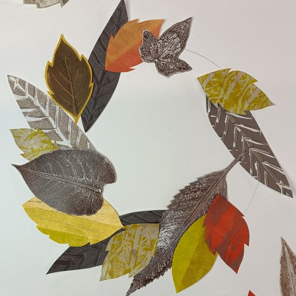 Arranging Gelli Plate Printed Wreath Leaves 