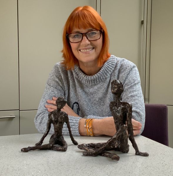 Jo with the small and large sculptures made in the Kit Video instruction