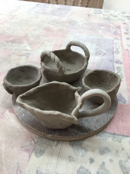 Experimenting with different pinch pot shapes