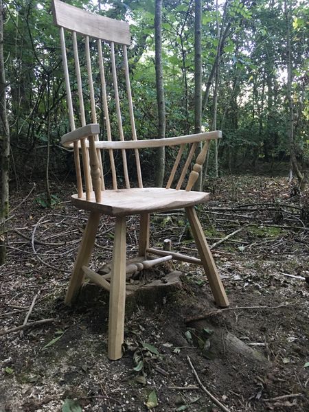 Chair over the stump of the tree it’s made from