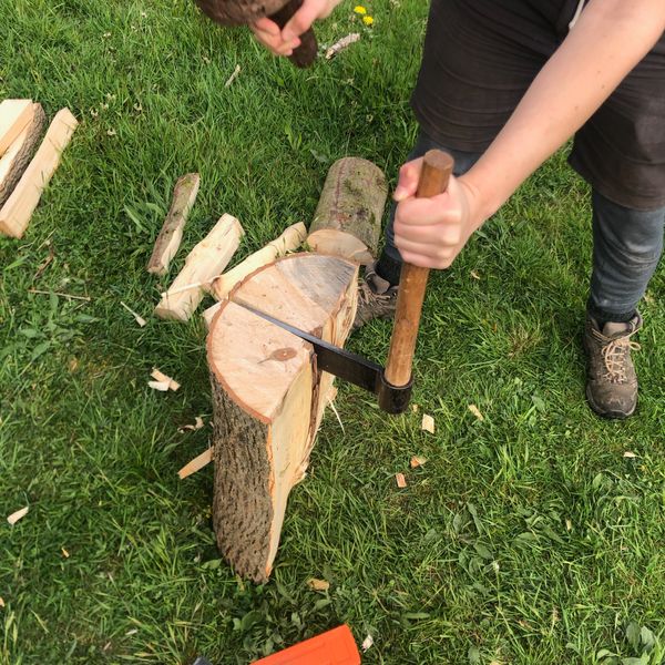 Cleaving or splitting a log
