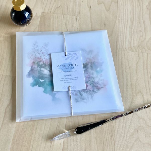 Watercolour print Lakeside Flowers card set presented in our unique translucent pack for easy an stylish gifting.