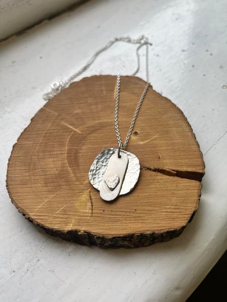 Heart and disc necklace